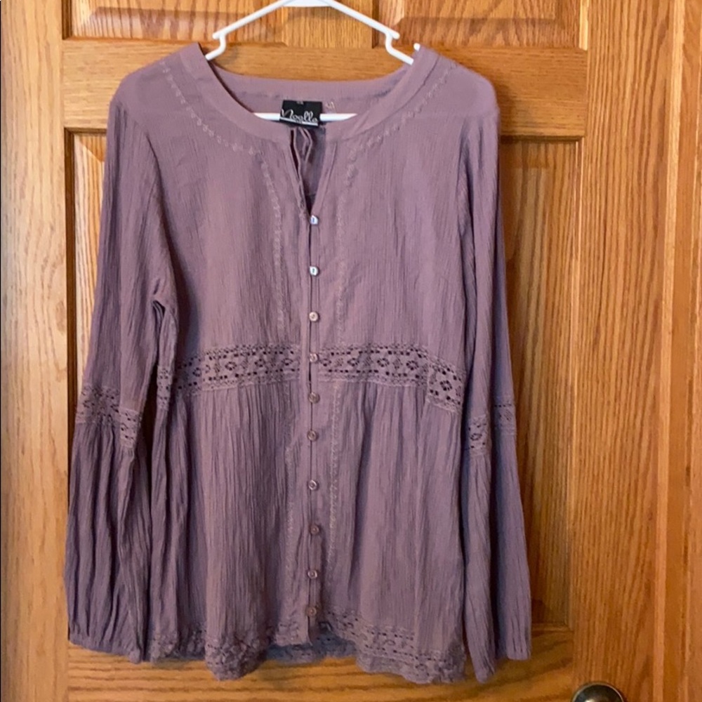 Women’s grayish/purple top smoke free home